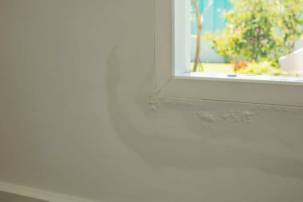 hail damage house siding house wall water stain peeling paint