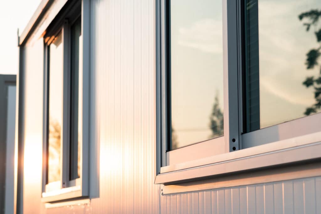 vinyl siding melting warm sunrise light shining on house